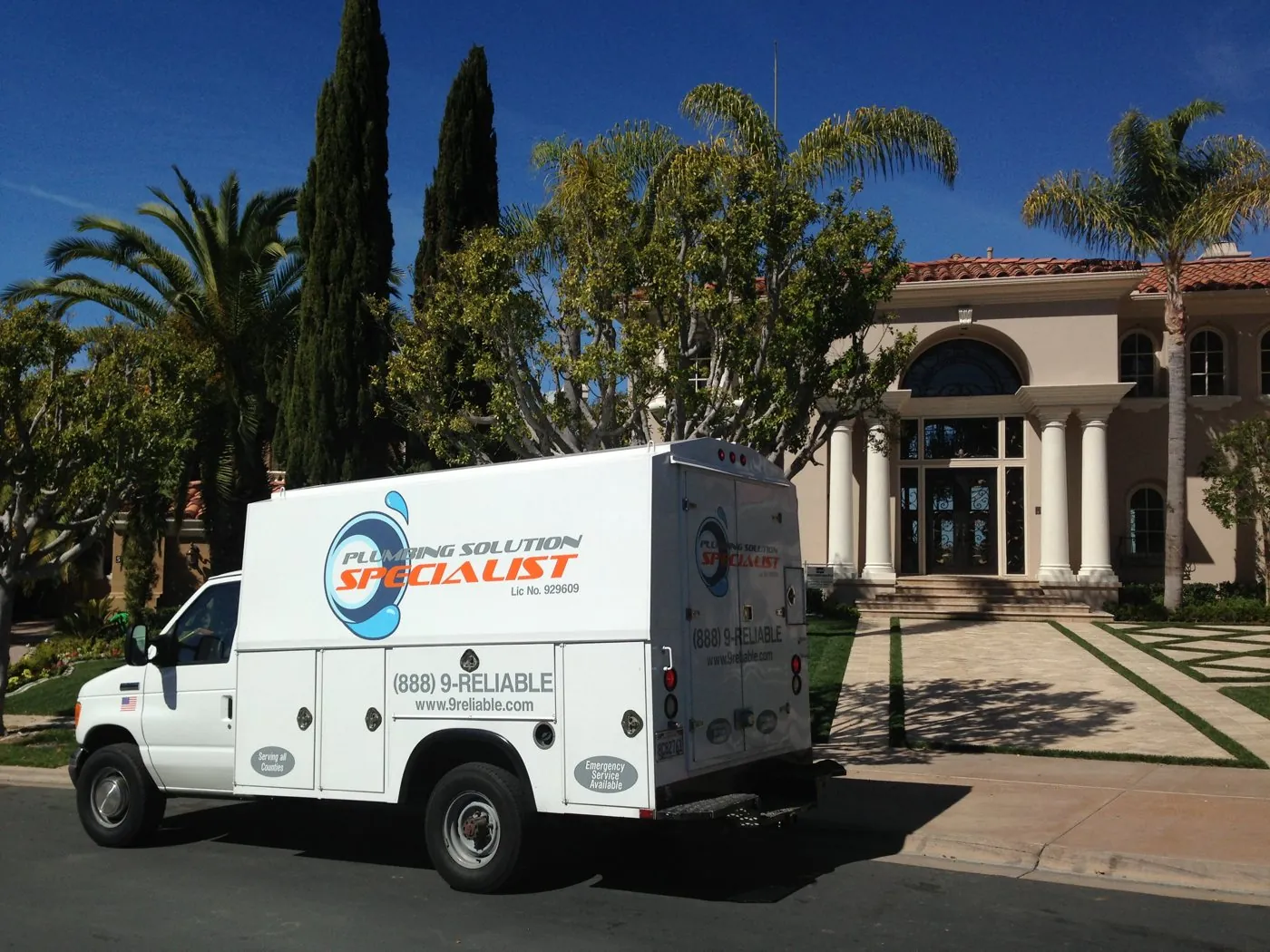 Plumbing Solution Specialist truck at a property
